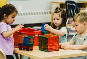 Kids play with puzzles