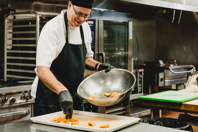 Preschool chef preparing food